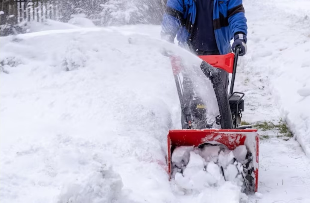 How do electric snow blowers work?